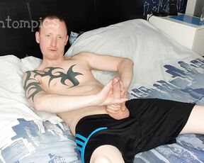 Tomtompics aka tomtompics OnlyFans - Lubing up my dick Im sat on the edge of the bed in some black adidas