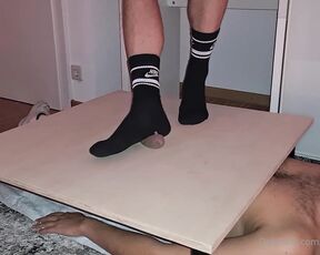 Footpigcrusher aka footpigcrusher OnlyFans - Trampling his cock on the cockboard and giving him a foot job black socks and barefoot)