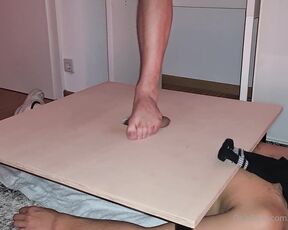 Footpigcrusher aka footpigcrusher OnlyFans - Trampling his cock on the cockboard and giving him a foot job black socks and barefoot)